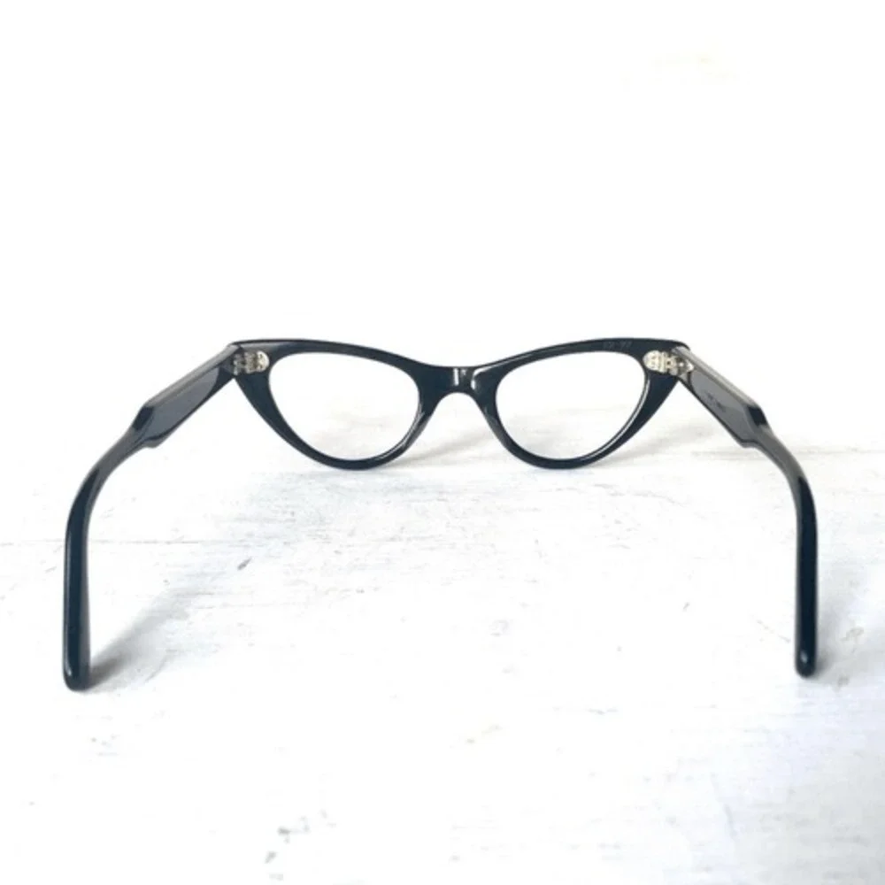 Vintage cat frame glasses by France Swank. Mint condition.